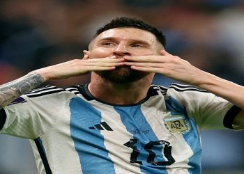 [File Photo]  December 13, 2022 Argentina's Lionel Messi celebrates after Julian Alvarez scores their third goal REUTERS/Kai Pfaffenbach