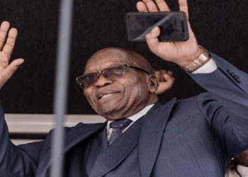 Former President Jacob Zuma waving at a crowd