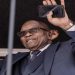 Image of former President Jacob Zuma waving at the crowd.