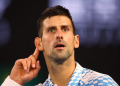 Serbia’s Novak Djokovic reacts during his semi final match against Tommy Paul of the U.S.