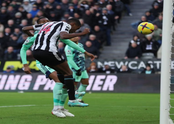 Newcastle United's Alexander Isak scores their first goal.