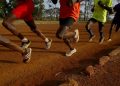 [file photo]Athletes exercise in the early morning in the sports ground of the University of Eldoret in western Kenya, March 21, 2016. REUTERS/Siegfried Modola/File Photo