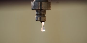 A tap and water droplet.