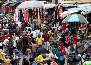 Shoppers crowd a market in Nigeria's commercial capital of Lagos, August 15, 2019.