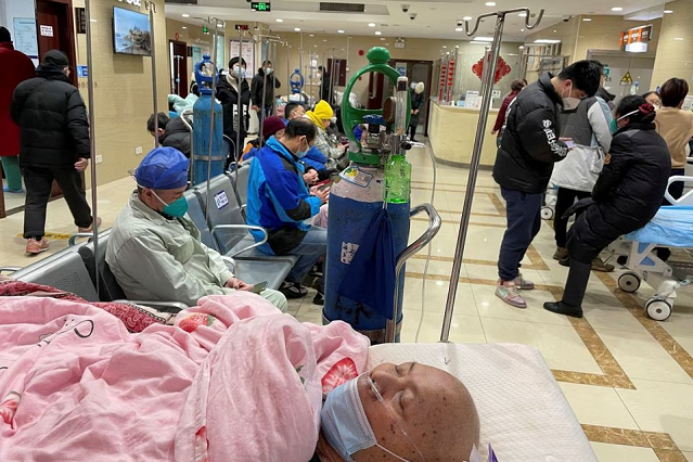 A patient lies on a bed at the emergency department of a hospital, amid the coronavirus disease (COVID-19) outbreak in Shanghai, China January 17, 2023