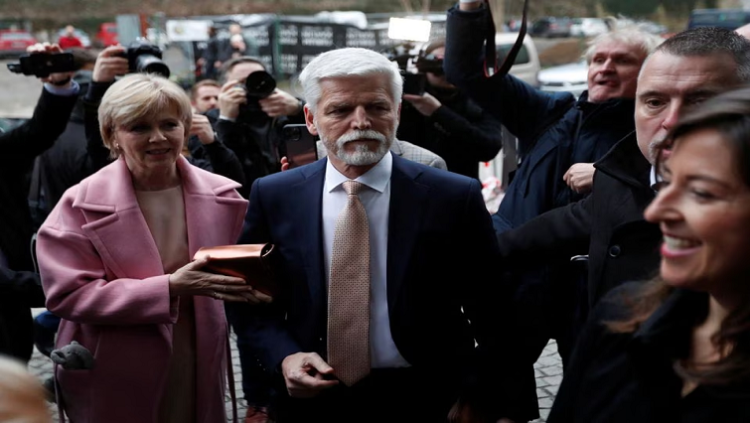 Czech presidential candidate Petr Pavel and his wife Eva Pavlova arrive at his headquarters, during the country's presidential election, in Prague, Czech Republic January 28, 2023.