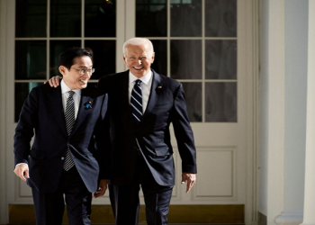 US President Joe Biden and Japanese Prime Minister Fumio Kishida walk through the colonnade on their way to the Oval Office at the White House in Washington, US, January 13, 2023.
