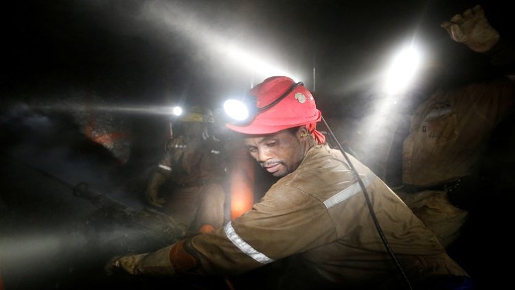 Miners work deep underground at Sibanye Gold's Masimthembe shaft in Westonaria, South Africa, April 3, 2017.