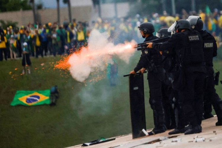 Security forces operate as supporters of Brazil's former President Jair Bolsonaro demonstrate against President Luiz Inacio Lula da Silva, outside Brazil’s National Congress in Brasilia, Brazil, January 8, 2023.