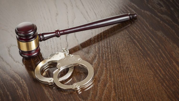 Illustration of handcuffs and gavel.