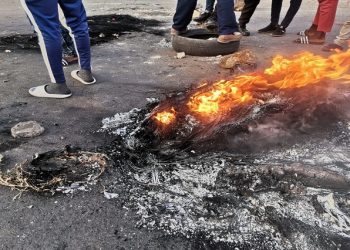 File Image: Protestors blockade roads with burning tyres.