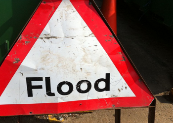 Flood warning road sign.