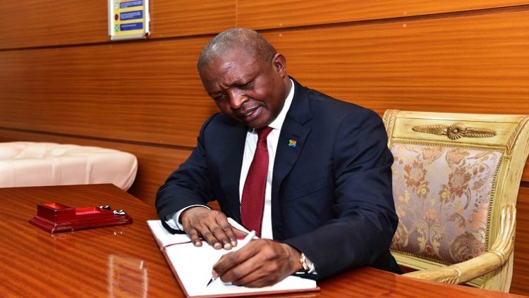 [File Image] Deputy President Mabuza signs a document.