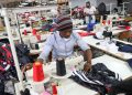A person works at ''The Faktory", a fashion design and clothing manufacturing company in Johannesburg, South Africa, March 4, 2021.
