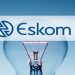 Eskom logo against an electric bulb