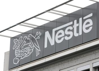 FILE PHOTO: The company's logo is seen at a Nestle plant in Konolfingen, Switzerland September 28, 2020. REUTERS/Arnd Wiegmann