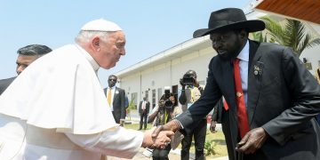 Pope Francis shakes hands with South Sudan's President Salva Kiir Mayardit, during a farewell ceremony before his departure in Juba, South Sudan, February 5, 2023.    Vatican Media