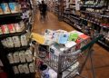 Shopping cart loaded with groceries