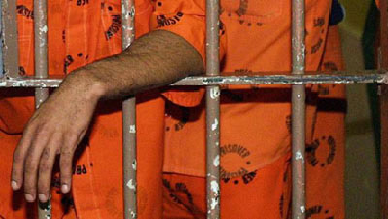 Prisoners behind bars