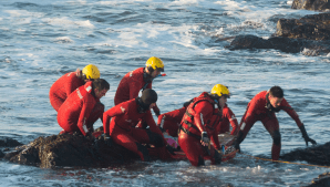FILE: NSRI members during a rescue