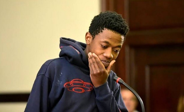 Mkhwanazi holding his chin in court