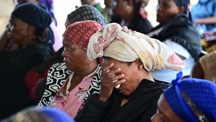 Family member emotional during Botswana government meeting with families of Limpopo bus crash victims