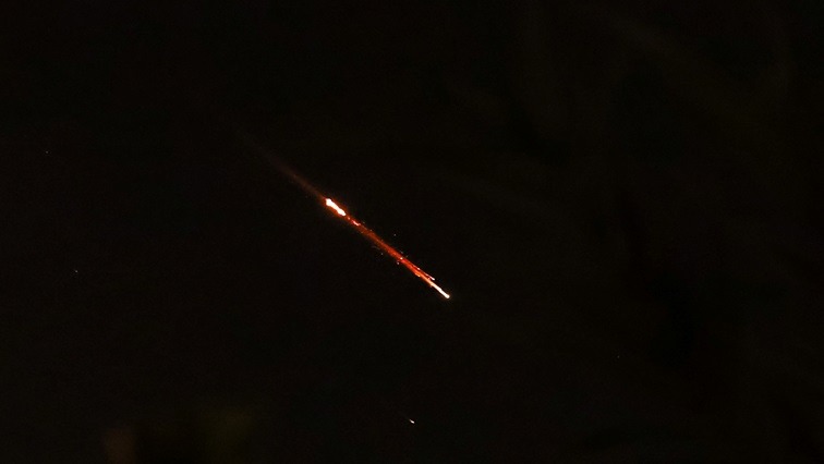 Objects are seen in the sky above Jerusalem after Iran launched drones and missiles towards Israel,