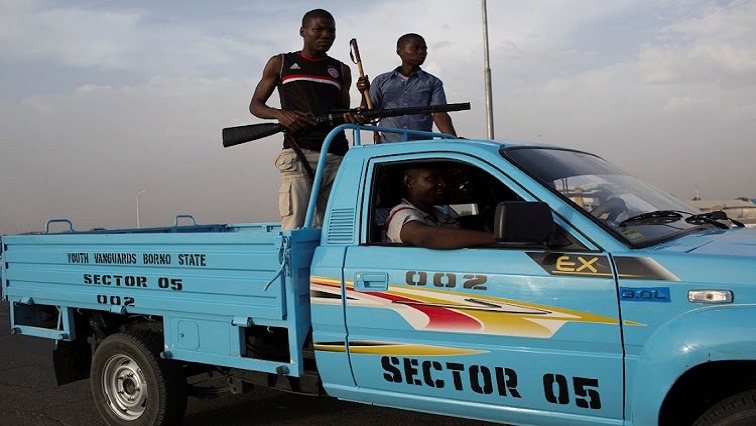 Members of Nigeria's civilian joint task force patrol in Maiduguri.
