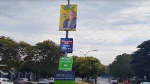 ANC, DA and ActionSA election posters hung on a lamp pole in Auckland Park, Johannesburg.